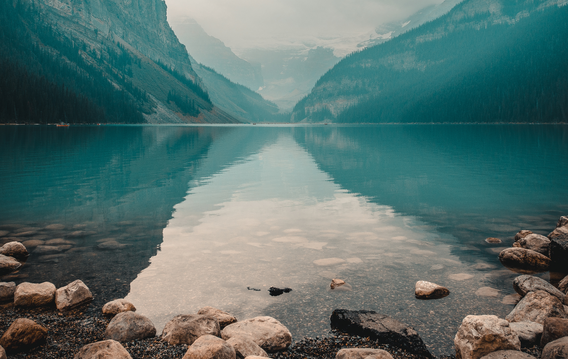 photograph of a lake in the mountains